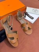 Женские сандалии Hermes коричневого цвета, артикул 340287