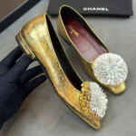 Женские балетки Chanel золотого цвета, артикул 340983 — фото 3