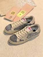 Женские кеды Golden Goose серебряного цвета, артикул 345421