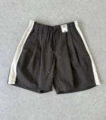 Мужские шорты Acne Studios коричневого цвета, артикул 346617