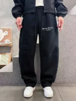 Мужские штаны Maison Margiela чёрного цвета, артикул 347266